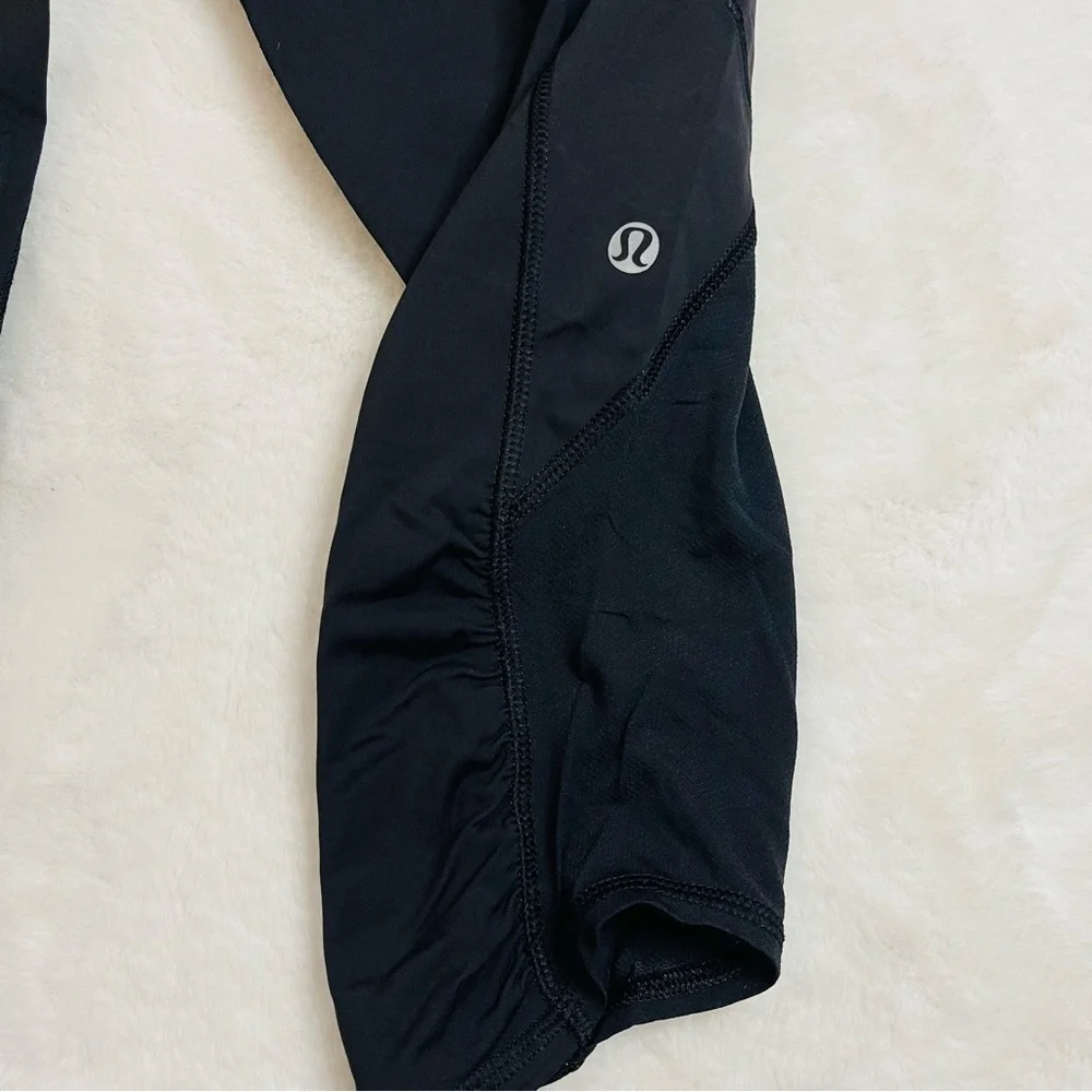 lululemon Cropped Black and Pink Floral Waistband Leggings